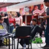 Realizan cortes de cabello gratis y reúnen útiles escolares en Mercado Municipal de Hermosillo